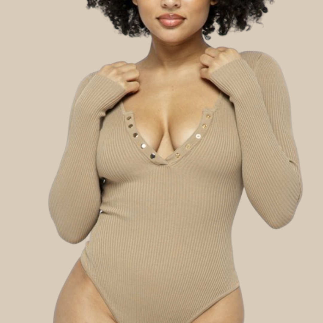 Finding the perfect bodysuit has never been so easy! This nude ribbed bodysuit is sleek & sexy for day or night!